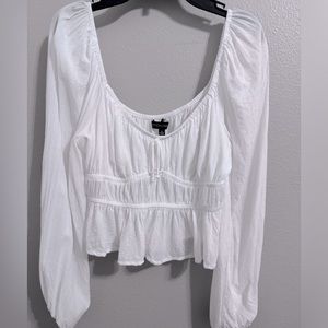 White gauze long sleeve top.